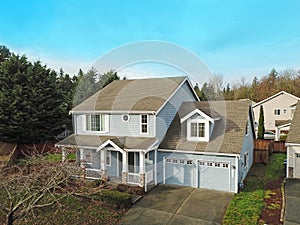 Charming blue two story home with a nice covered porch.