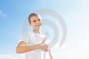 Charming Boy with thumbs up
