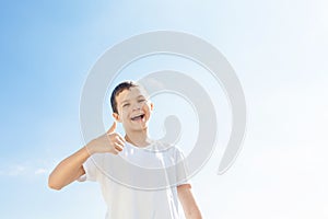 Charming Boy with thumbs up