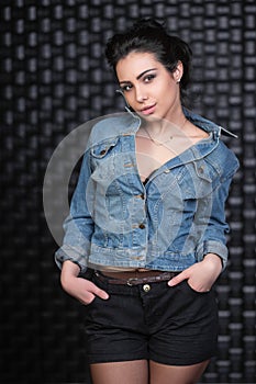 Charming brunette posing in the studio