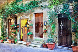 Charming floral streets of medieval towns of Italy. Pitigliano,