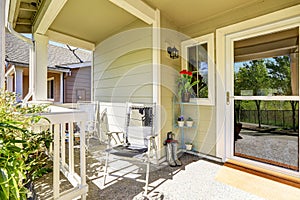 Charming front porch of a freshly remodeled home.