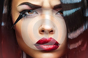 Charming girl frowns on camera