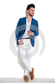 Charming guy holding one of his hand in his pocket