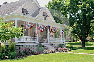 Charming home decorated with American flags for the Fourth of July