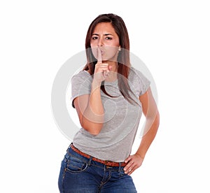Charming latin young woman requesting silence photo