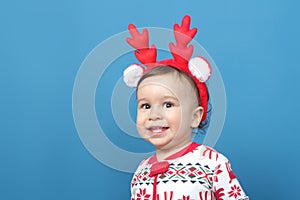Charming little boy in Christmas pajamas