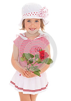 Charming little girl with red rose flower
