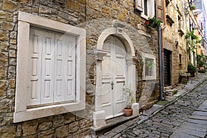 charming little village in Croatia called the istrian Toscana with nice white entrance door