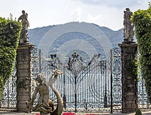 A charming look from Villa Carlotta in Tremezzo to Lake Como and the Alps.