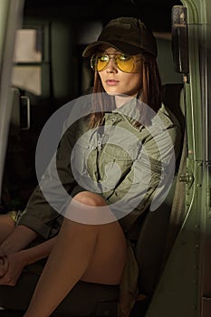 Charming model wearing green jacket.