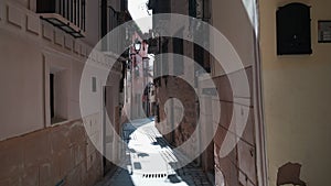 Charming narrow street of old town of Toledo city. Spain