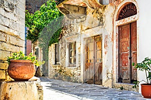 Charming narrow streets of traditional greek villages - Naxos is photo