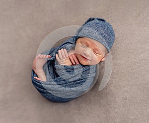 Charming newborn smiling in dream