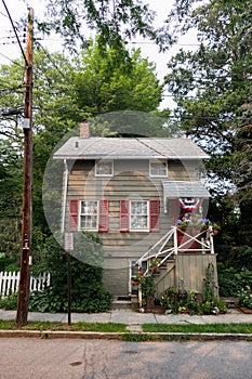 Charming Old Wood Neighborhood Home with Shutters and Green Trees in Cold Spring New York