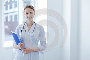 Charming practitioner expressing delight at work