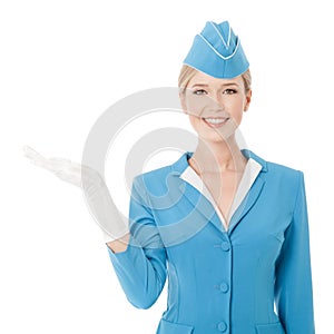 Charming Stewardess In Blue Uniform Holding In Hand On W