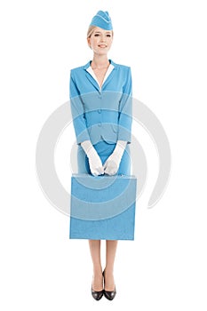 Charming Stewardess In Blue Uniform And Suitcase On Whit