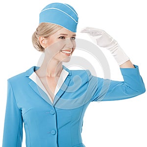 Charming Stewardess In Blue Uniform On White Background