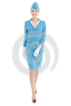 Charming Stewardess In Blue Uniform On White Background