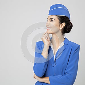 Charming Stewardess Dressed In Blue Uniform