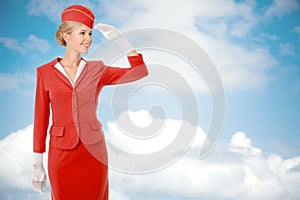 Charming Stewardess Dressed In Red Uniform.