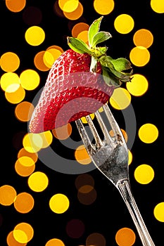 Charming Strawberry on a Silver Fork
