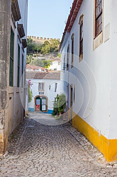 Charming streets of old town Obidos in Portugal