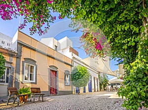 Charming streets with traditional houses in Faro, Algarve, Portugal