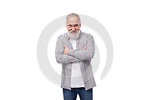 charming stylish mature man with a white beard and mustache looks solid for his age