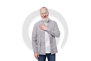 charming stylish mature man with a white beard and mustache looks solid for his age