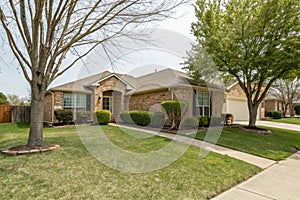 Dallas Texas suburban home with lawn photo