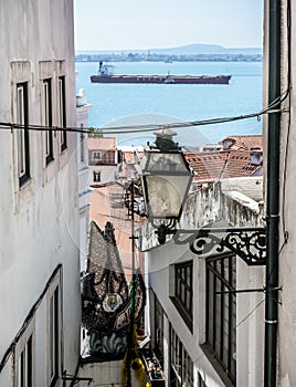 Charming view on rio tajo with empty cargo ship lisbon