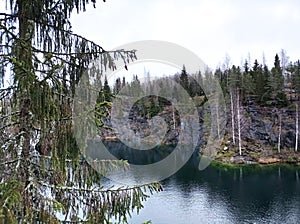 Charming views of nature, Karelia, Ruskeala Mountain Park, northern landscape, large stones, beautiful lake, large pond, rocks