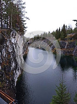 Charming views of nature, Karelia, Ruskeala Mountain Park, northern landscape, large stones, beautiful lake, large pond, rocks