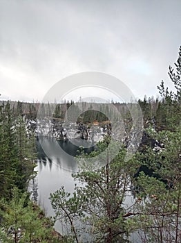 Charming views of nature, Karelia, Ruskeala Mountain Park, northern landscape, large stones, beautiful lake, large pond, rocks