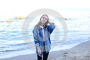 Charming woman with beautiful smile posing on camera, standing o