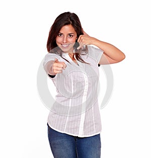 Charming woman gesturing call me pointing at you