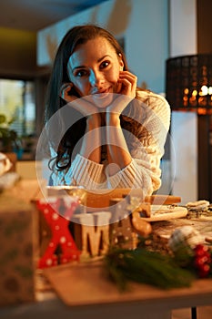 Charming woman making a christmas cookies and sweets