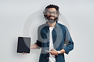 Charming young African man in eyewear