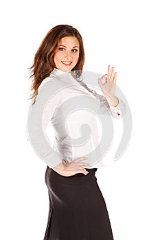 Charming young businesswoman isolated on white background