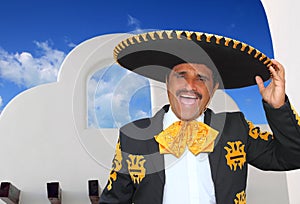 Charro mariachi portrait singing in mexican house photo