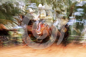 Abstract of a Mexican cowboy performing Charro Riding photo