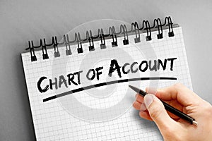Chart of Account text on notepad, business concept background photo