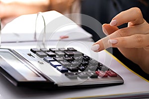 Chartered Accountant Hand Calculating Tax