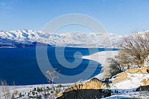 Charvak reservoir in winter in Uzbekistan . Beautiful winter landscape. The Tien Shan mountain system in Central Asia