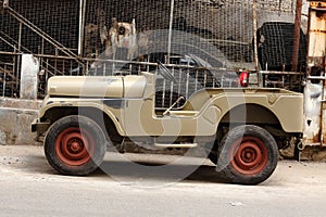 Chasis of a jeep being modified and painted photo