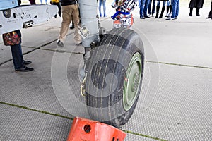 Chassis of a military aircraft. Su-35 fighter at the air show. Aircraft on the airfield to show the audience. photo