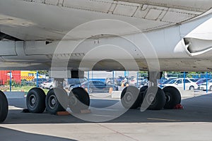 Chassis, wheels and bottom of the aircraft in the Parking lot of the treadmill