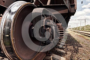 Chassis, wheels of a railway car, rails - the concept of transportation and shipping